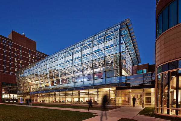 Chicago Life Science Construction - Loyola Chicago IES exterior entrance with atrium at dusk